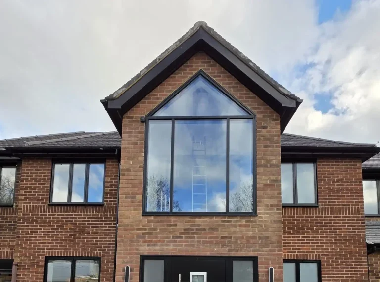 Triangle Gable Windows supply and installation by Durajoin