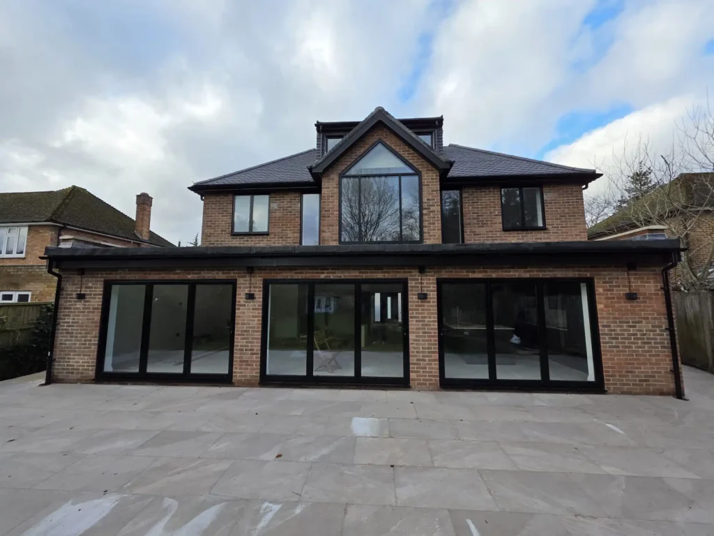 Modern London home with bespoke aluminium windows and sliding doors supplied and installed by Durajoin.