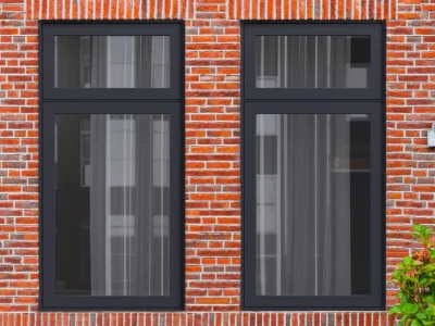 Black aluminium flush casement windows installed at a contemporary London home by Durajoin